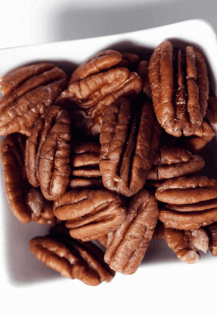 Pecans on white bowl